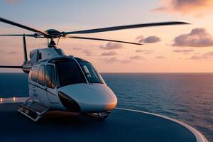 White helicopter landing on helipad of yacht at sunset over calm ocean photo