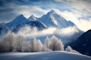 A snowy mountain range with trees and clouds photo
