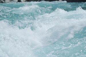A close up of a wave in the water photo