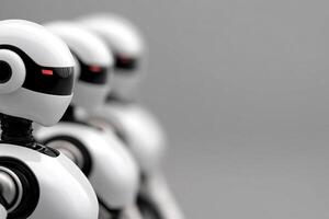 A row of white robots standing in a row photo