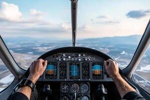 A person is driving a small airplane with the controls in the cockpit photo