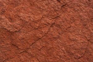 Red Brown Stone Background With Mountain Texture Close Up, Bright Rock Surface Ideal For Design Projects And Nature Themes, Perfect For Use In High-Resolution Textures And Backdrops photo