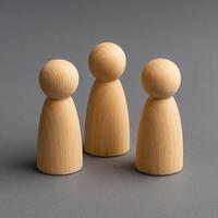 Wooden Human Figurines in Discussion Circle Representing Communication and Collaboration photo