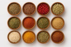 Twelve Wooden Bowls Displaying Assorted Dried Spices Seeds Herbs and Powders for Culinary and Medicinal Use photo