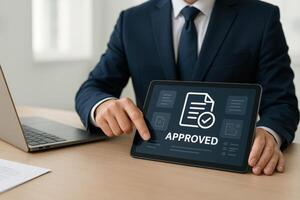 Businessman Interacting With Approved Document Icon on Digital Tablet for Project Proposal Approval and Quality Assurance photo