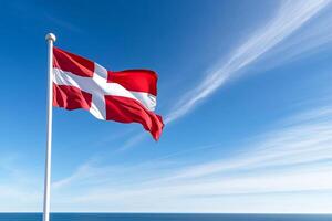 A flag flying in the wind on a sunny day photo