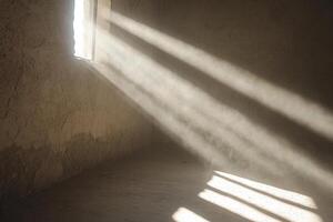 Sunlight shining through a window in an old building photo