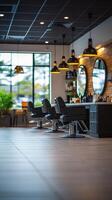 Bright and modern salon features sleek black chairs, wooden accents, and large mirrors reflecting the vibrant atmosphere created by natural light photo