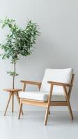 A chic, modern chair with a wooden frame sits beside a small table in a bright space adorned with a green potted plant, creating a serene environment photo