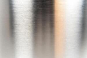 A close up of a metal container with a shiny surface photo