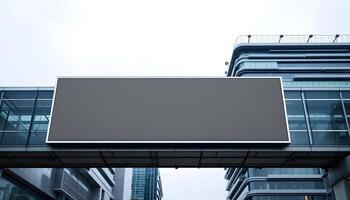 A wide shot of a large, horizontal electronic billboard with a blank, dark screen photo