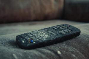 A remote control is covered in white powder photo