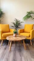 Yellow armchairs and wooden table in cozy lounge area photo
