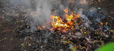 Environmental Impact of Waste Burning Hazardous Fires from Garbage photo