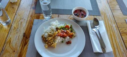 Indonesian Meal on a Dining Table photo