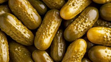 Pickled cucumber or gherkin or dill pickle background photo