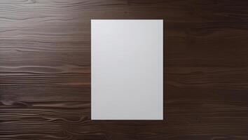 White blank paper on wooden background photo