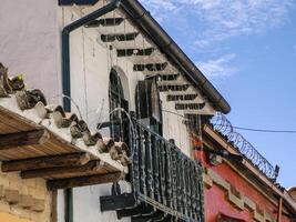 old painted building in Candelaria historic downtown district, Bogota colombia photo