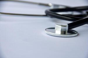 Close up view of stethoscope with customizable space for text. Medical and health concept. photo