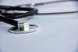 Close up view of stethoscope with customizable space for text. Medical and health concept photo