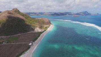 Aerial view of Lombok coastline with white sand and clear waters video
