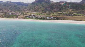 Aerial view of a tropical resort on the shore of Lombok, Indonesia video
