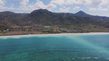 Aerial view of pristine tropical beach with turquoise water in Lombok video