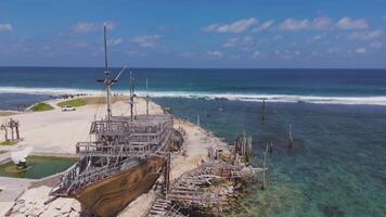 Aerial view of Bali coast with cliffs, ocean waves, and greenery video