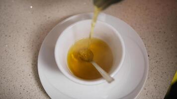 Relaxing Herbal Tea Poured Into A Cup In The Afternoon At Home photo