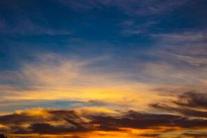 hazy sky view at sunset. orange clouds photo