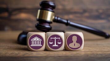 Wooden blocks symbolize law justice and client representation with a judge s gavel in the background photo