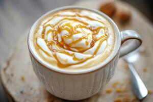 A coffee with caramel and nuts in it photo