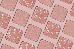 Eyeshadow palette, mix of matte and shimmer shades in pink hues with white. Aesthetic top view pattern for beauty, makeup, cosmetics themes, Pale pink colored swatches eyeshade refills photo