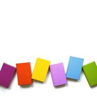 Multicolors book minimal pattern with bright colorful cover, handback books, Top view mockup for library, education theme. Read paper book and study concept. Isolated on white background photo