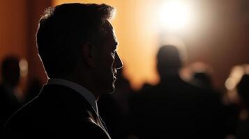 The politician takes a moment to listen intently to a reporters question reflecting a blend of poise and vulnerability while the blurred silhouettes of onlookers create a sense of urgenc photo