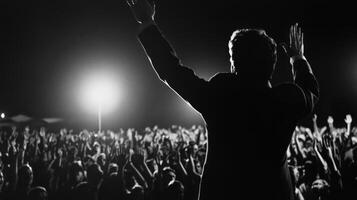 The politician midspeech displays a blend of emotion with a slight tear in their eye showcasing the weight of the moment. Silhouettes of supporters can be seen in the background raisin photo