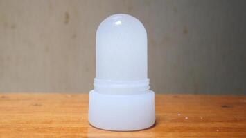 A stick of alum used as a natural deodorant for underarms photo