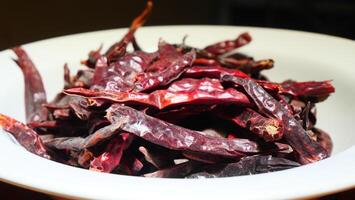 Dried red and dark chilies, a key ingredient in Asian cooking photo