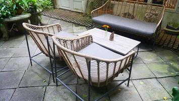 Stylish table and chair set for decorating home and garden photo