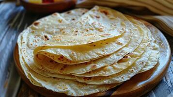 A Stack of Golden Tortillas Ready for a Delicious Meal photo