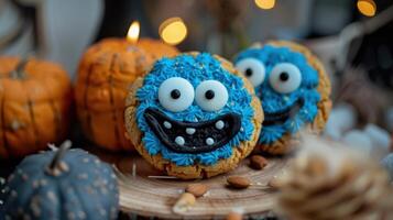 Festive Halloween Cookies With Blue Furry Faces photo