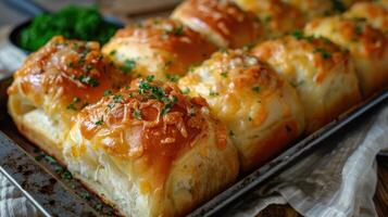Golden Cheesy Rolls Fresh From The Oven photo