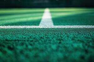 A tennis court with a white line on it photo