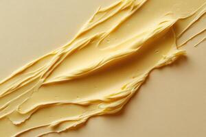 Close-Up View of a Smooth Yellow Cream Moisturizer Perfect for Skincare Routine Enhancement photo