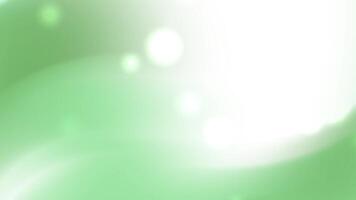 Green background with soft white glows suitable for ecofriendly designs nature concepts serene images wellness themes and calming visuals video