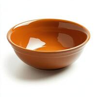 A large orange bowl on a white background photo