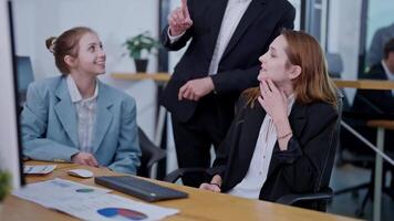 Business team discusses project updates and strategies in modern office setting video