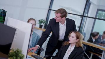 Collaborative meeting in a modern office with team discussing project strategies video