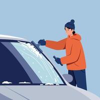 Young man in orange hoodie and blue hat scraping ice off car windshield in cold weather flat design illustration vector