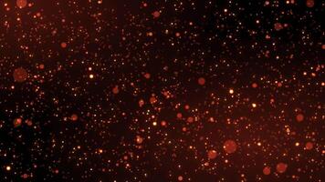 Abstract animation concept of golden particles for celebrating birthdays and holidays. 4k loop bokeh background with light particles on a dark background. video